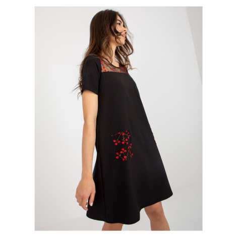 Black cocktail dress with short sleeves