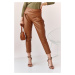 Fashionable brown trousers made of artificial leather for women