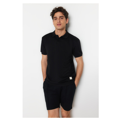 Trendyol Black Regular/Regular Fit Short Sleeve Label Appliqué Polo Neck T-shirt