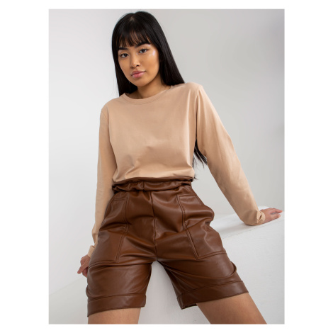 Brown insulated shorts made of eco-leather for leisure time