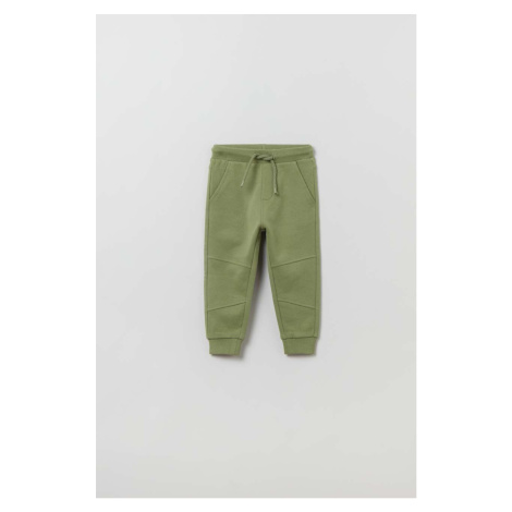 Detské bavlnené tepláky OVS zelená farba, jednofarebné