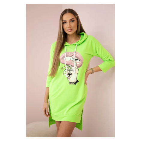 Dress with a longer back and a colorful green neon print