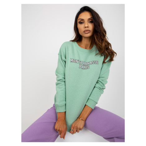 Light green hoodie with print