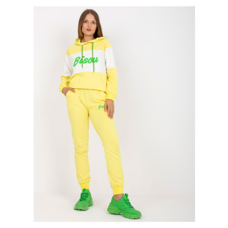 Yellow and green tracksuit set with a hoodie