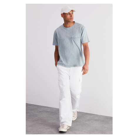 Trendyol Pale Blue Relaxed/Comfortable Fit Weathered/Faded Effect 100% Cotton T-Shirt with Pocke