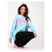 Light blue and pink sweatshirt with a colourful print