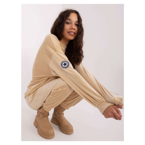 Beige women's velour set with trousers