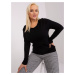 Black oversized knitted sweater with a round neckline