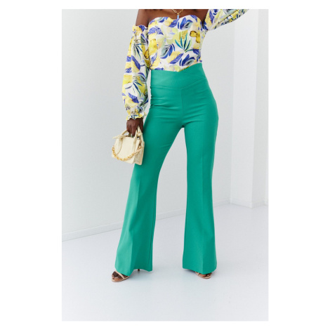 Elegant green women's trousers with flared legs FASARDI