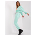 Mint and fluoroorange tracksuit with letter A