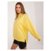 Yellow hoodie with appliqués