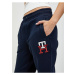 Tmavomodré unisex tepláky Tommy Hilfiger