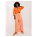 Orange wide trousers with SUBLEVEL print