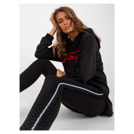 Black casual leggings with lettering on the sides