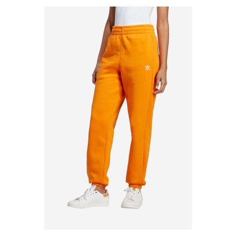 Bavlnené tepláky adidas Originals IK7689-POMARANCZ, oranžová farba, jednofarebné
