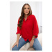 Oversized blouse with red button fastening