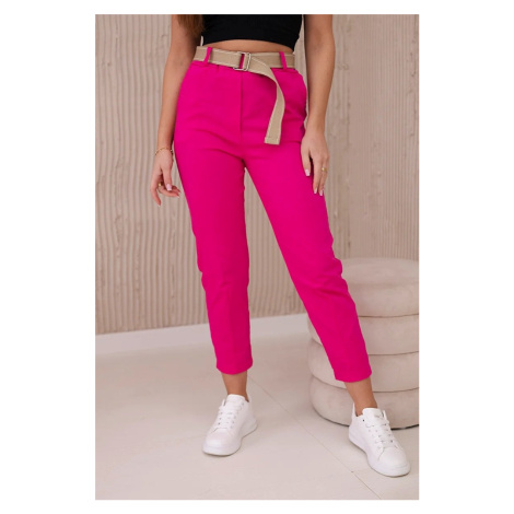 Fuchsia-coloured trousers with wide belt