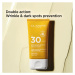 Clarins Youth-Protecting Sunscreen High Protection opaľovací krém na tvár SPF 30