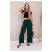 Wide-waisted trousers in dark green colour