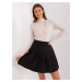 Black bell-shaped miniskirt with pleats