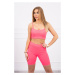 Complete with high-waisted trousers pink neon