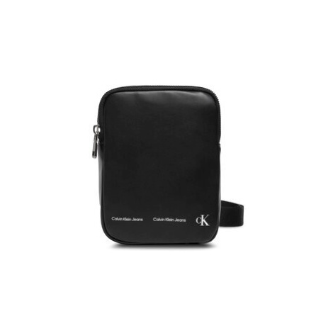 Calvin Klein Jeans Puzdro na telefón Logo Stripe N/S Phone Xbody K50K508900 Čierna