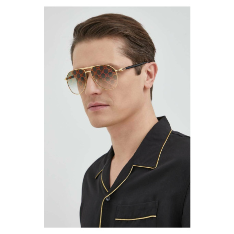 Slnečné okuliare Gucci pánske, zlatá farba