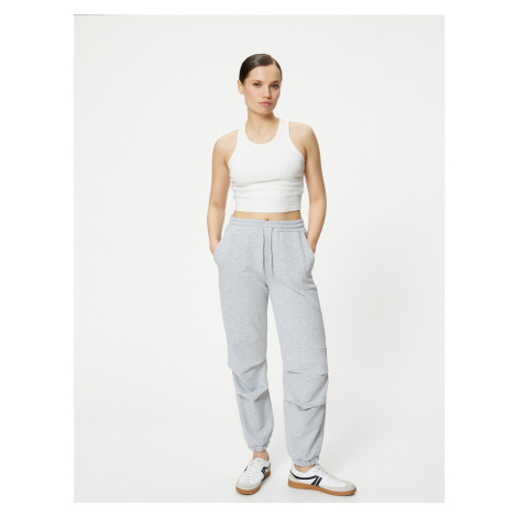 Koton Jogger Pants with Tie Waist, Pockets and Elastic Legs.