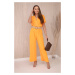 Jumpsuit with a decorative belt at the waist in orange color