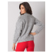 Pletený sveter s vrkočovým vzorom