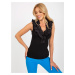 Black ribbed top with ruffles at neckline