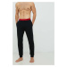 Pyžamové nohavice HUGO pánske,čierna farba,jednofarebná,50480236