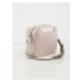 Light pink women´s handbag with a decorative handle
