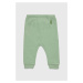 Detské bavlnené nohavičky United Colors of Benetton zelená farba, jednofarebné